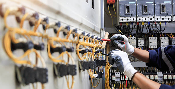 Professional Electrician technician working in East Bernard, TX